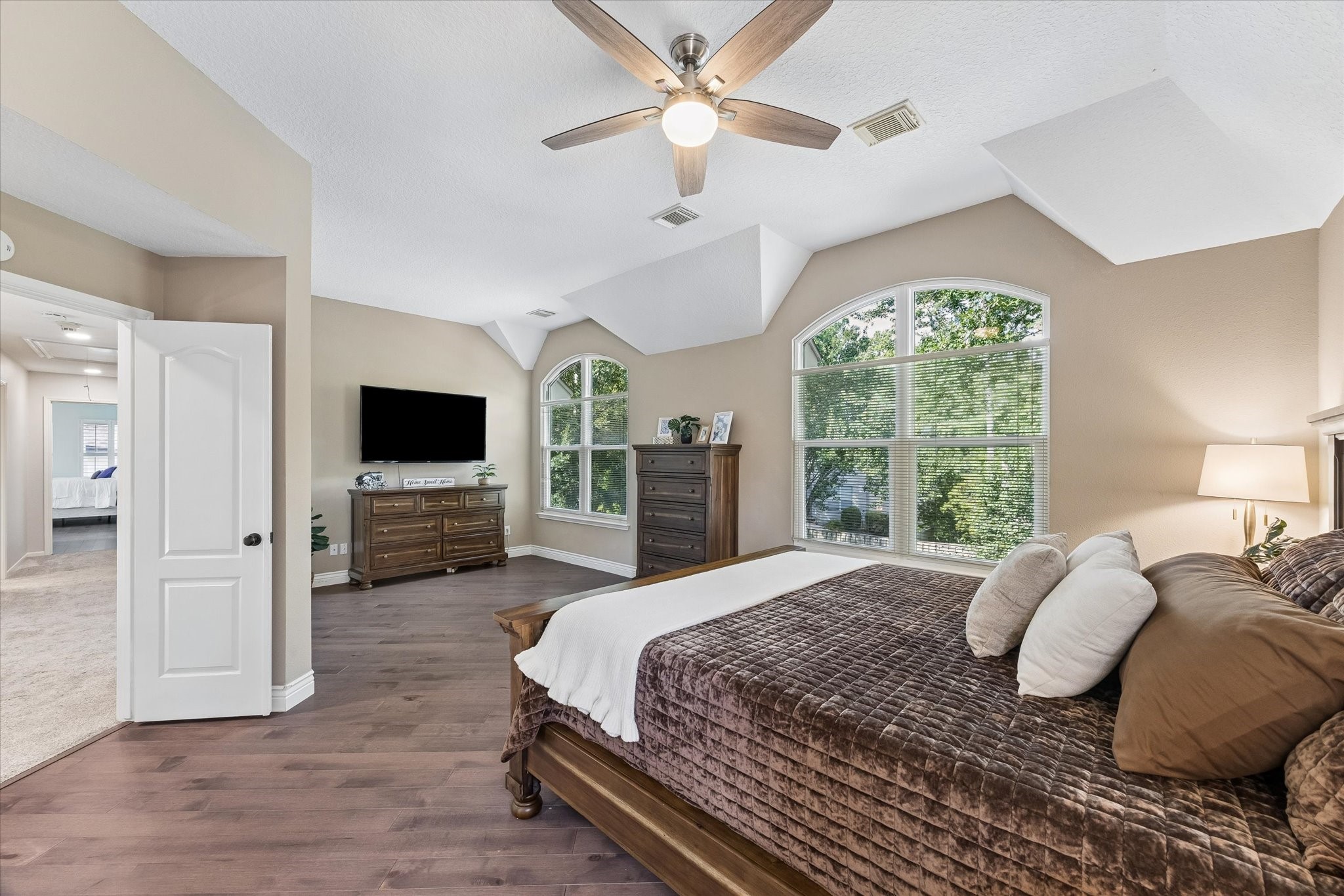 39 Purple Martin Place Spring, TX 77381 - Photo 23 of 43 Look at all the room on the other side of this huge primary. Lots of room for a love seat and two sitting chairs.