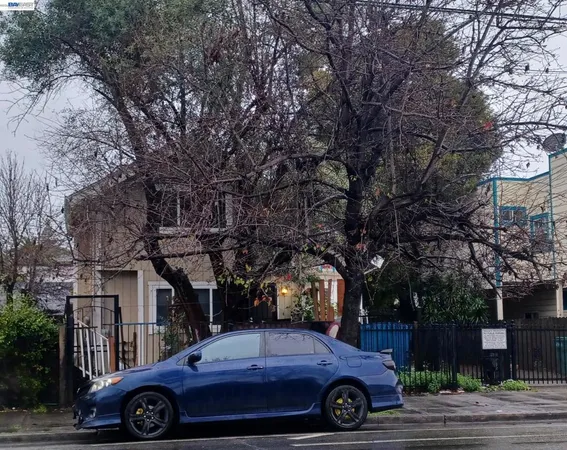 a view of car parked in front of house