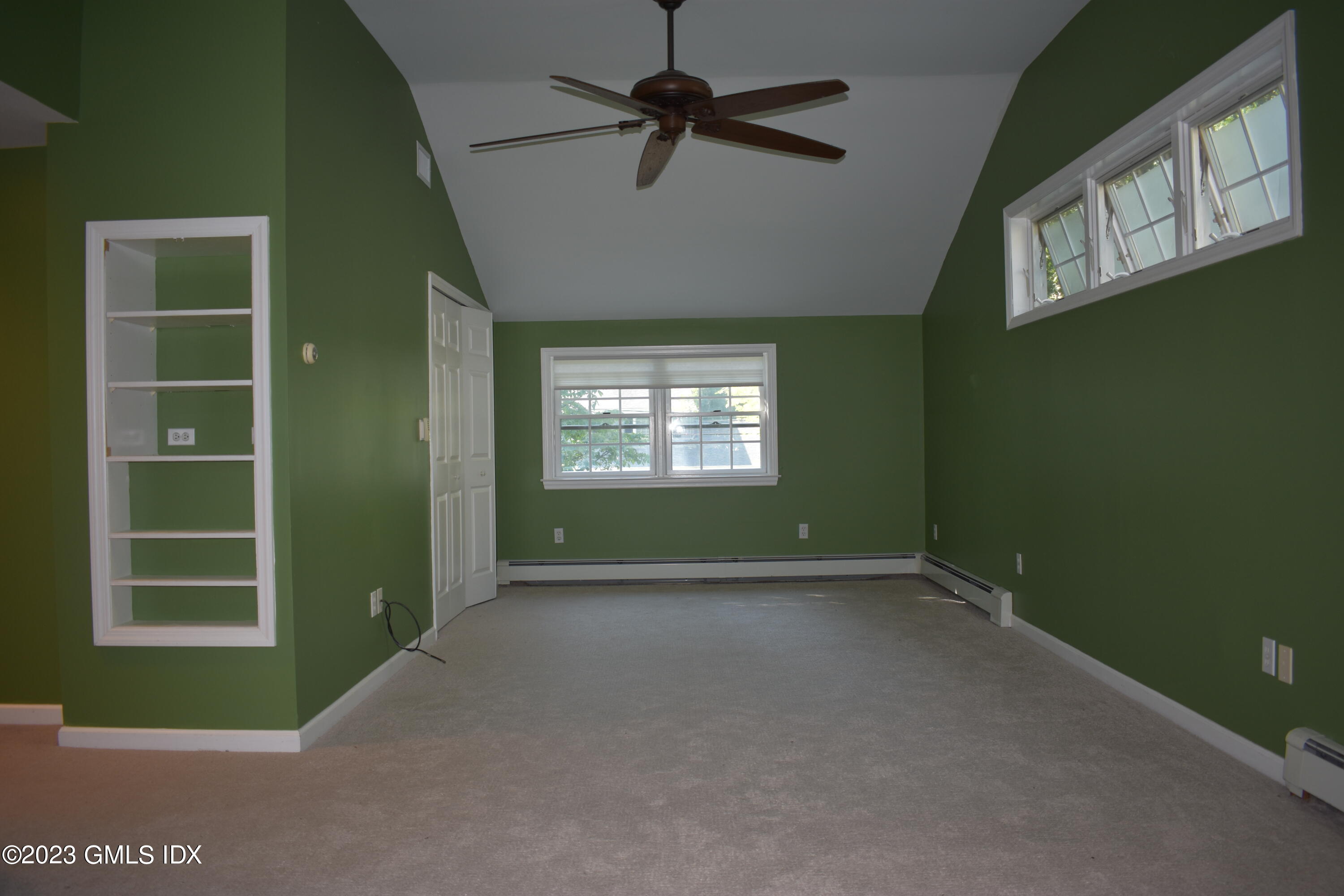 5 Tory Road Riverside, CT 06878 - Photo 18 of 26 a view of an empty room with a window and a kitchen