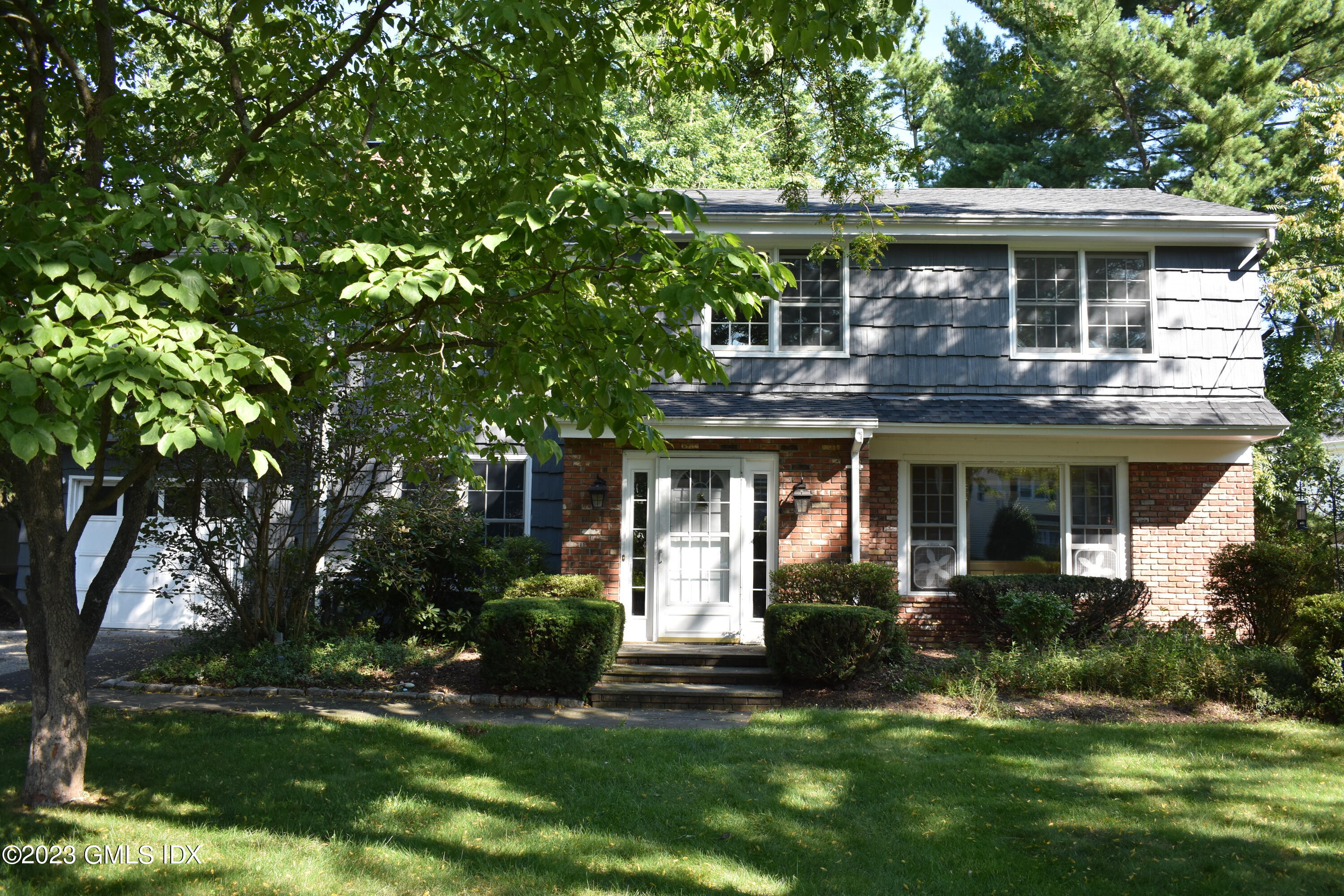5 Tory Road Riverside, CT 06878 - Photo 26 of 26 a front view of house with a garden