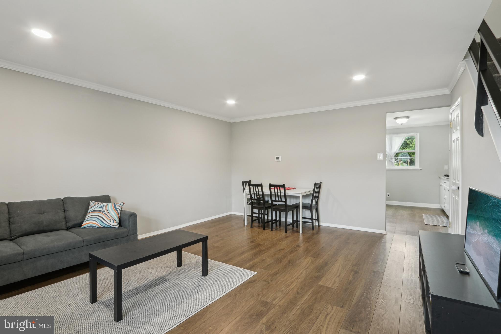 3207 Fairdale Road Philadelphia, PA 19154 - Photo 25 of 49 a living room with furniture and a flat screen tv