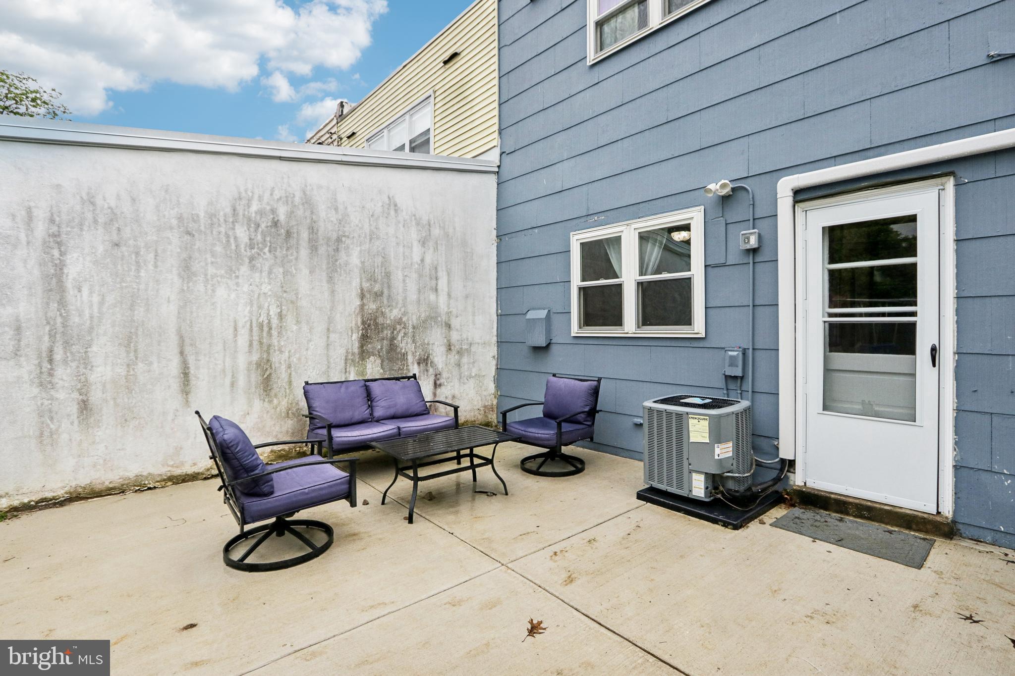 3207 Fairdale Road Philadelphia, PA 19154 - Photo 49 of 49 a building outdoor space with patio furniture and potted plants