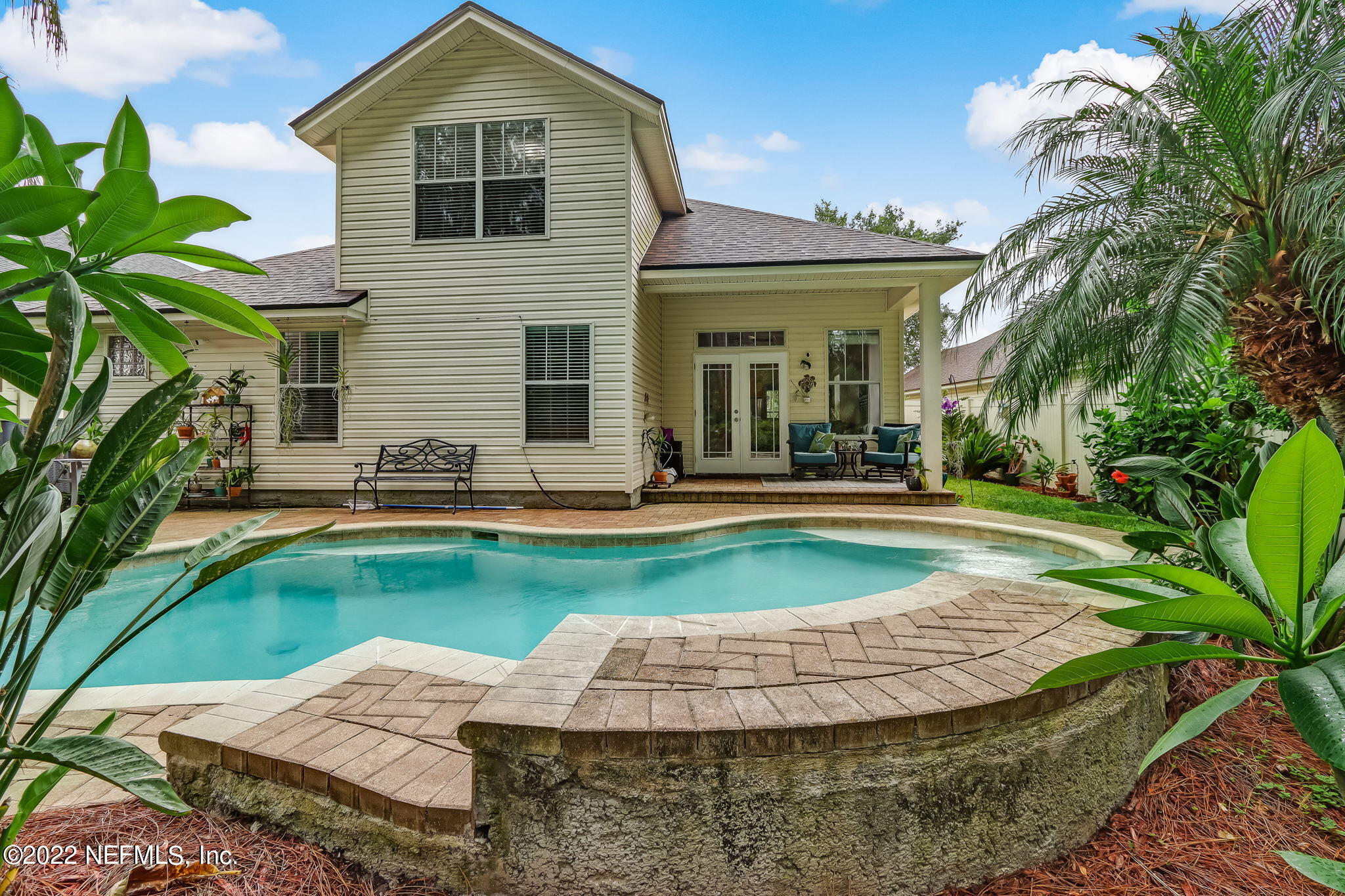 96692 Commodore Point Drive Yulee, FL 32097 - Photo 34 of 38 a view of a house with swimming pool and sitting area