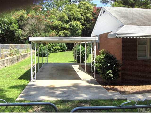 Fantastic carport will accomodate 2 cars.