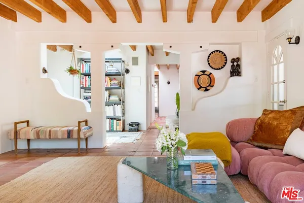 a living room with furniture and rug