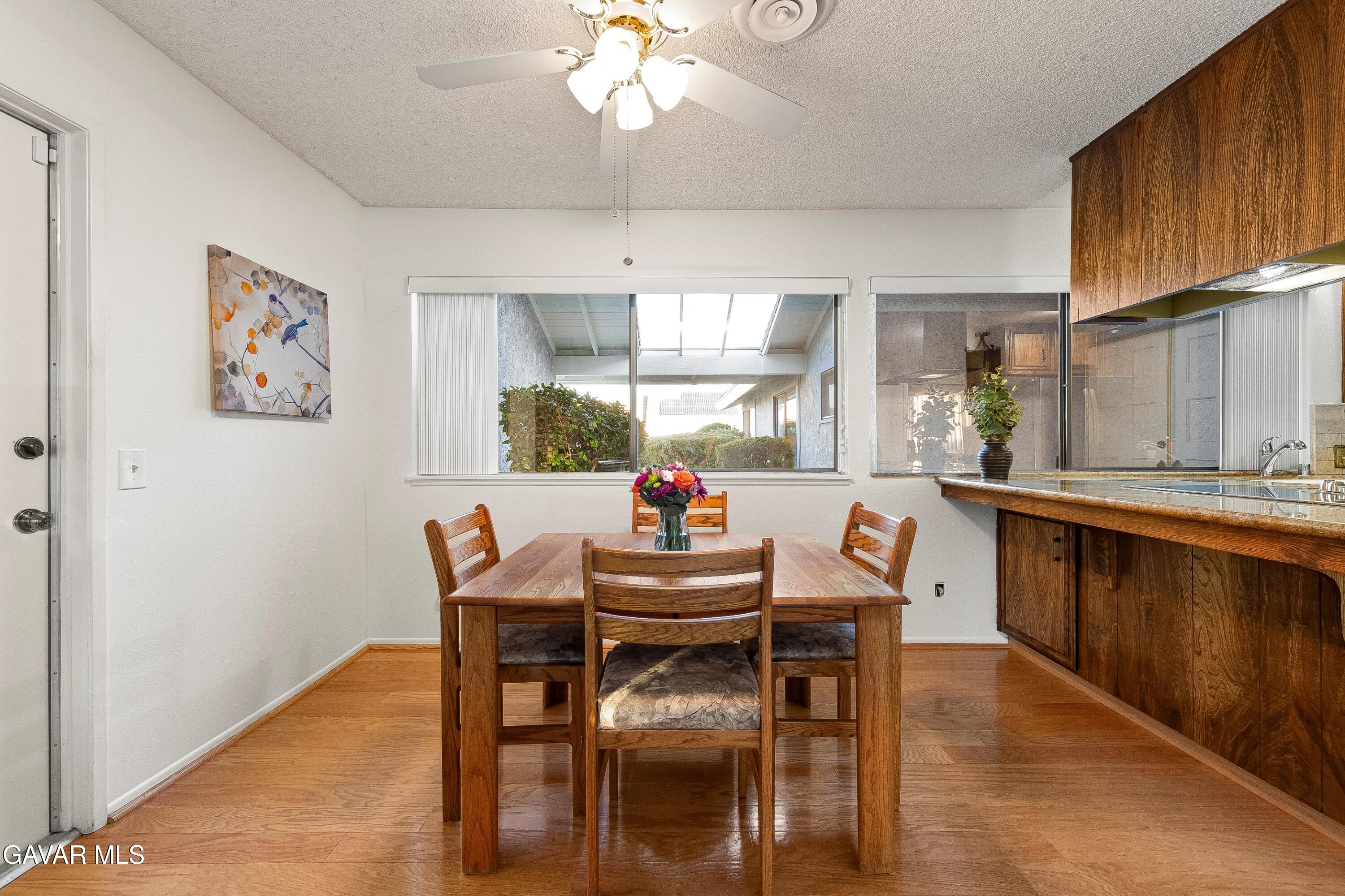 43755 Sentry Lane Lancaster, CA 93536 - Photo 14 of 36 a dining room with furniture and window
