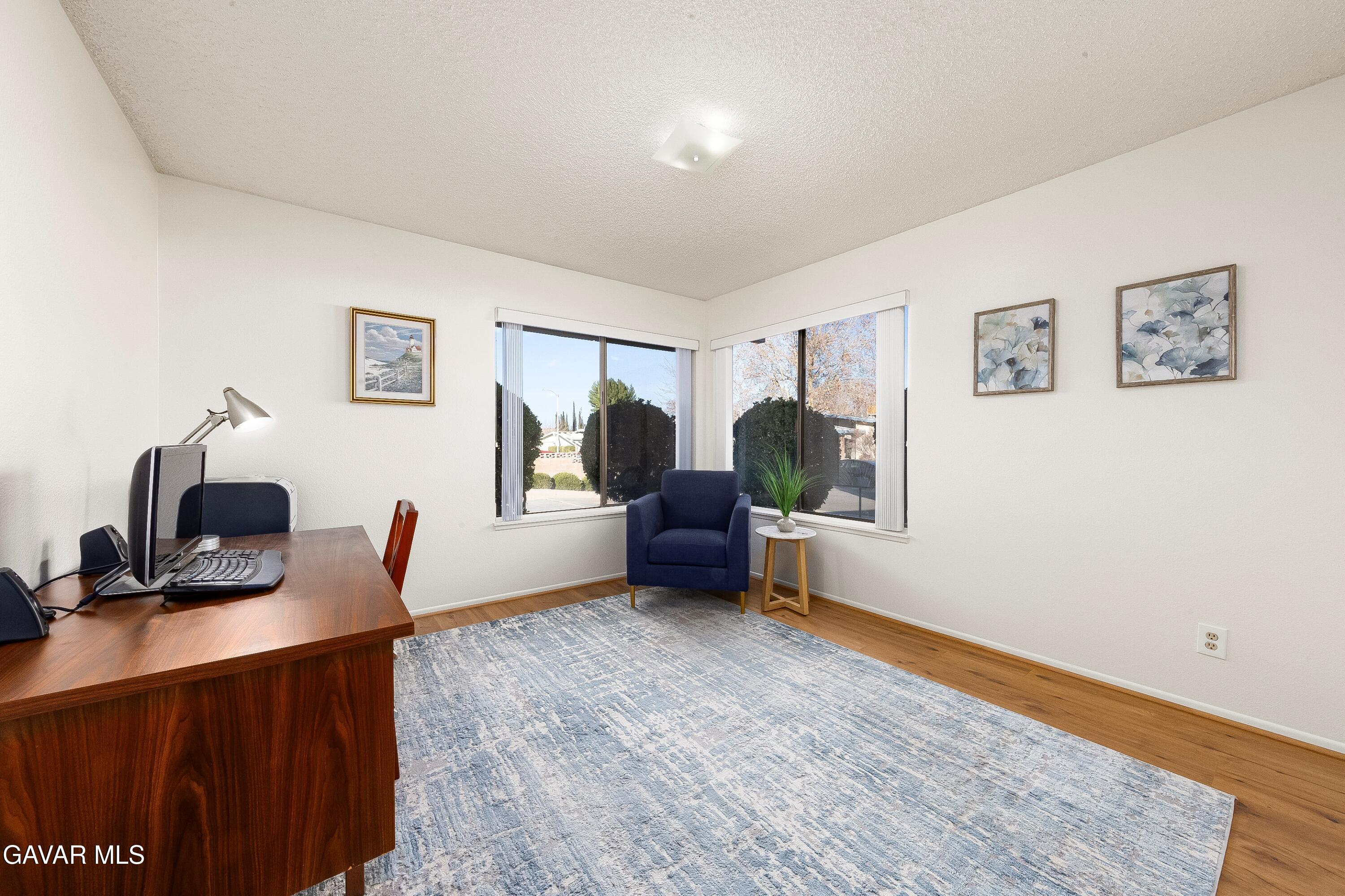 43755 Sentry Lane Lancaster, CA 93536 - Photo 24 of 36 a bedroom with furniture and a window