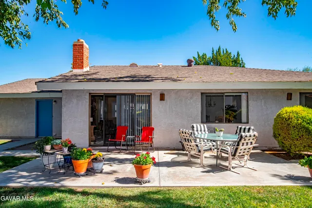 a front view of a house with patio
