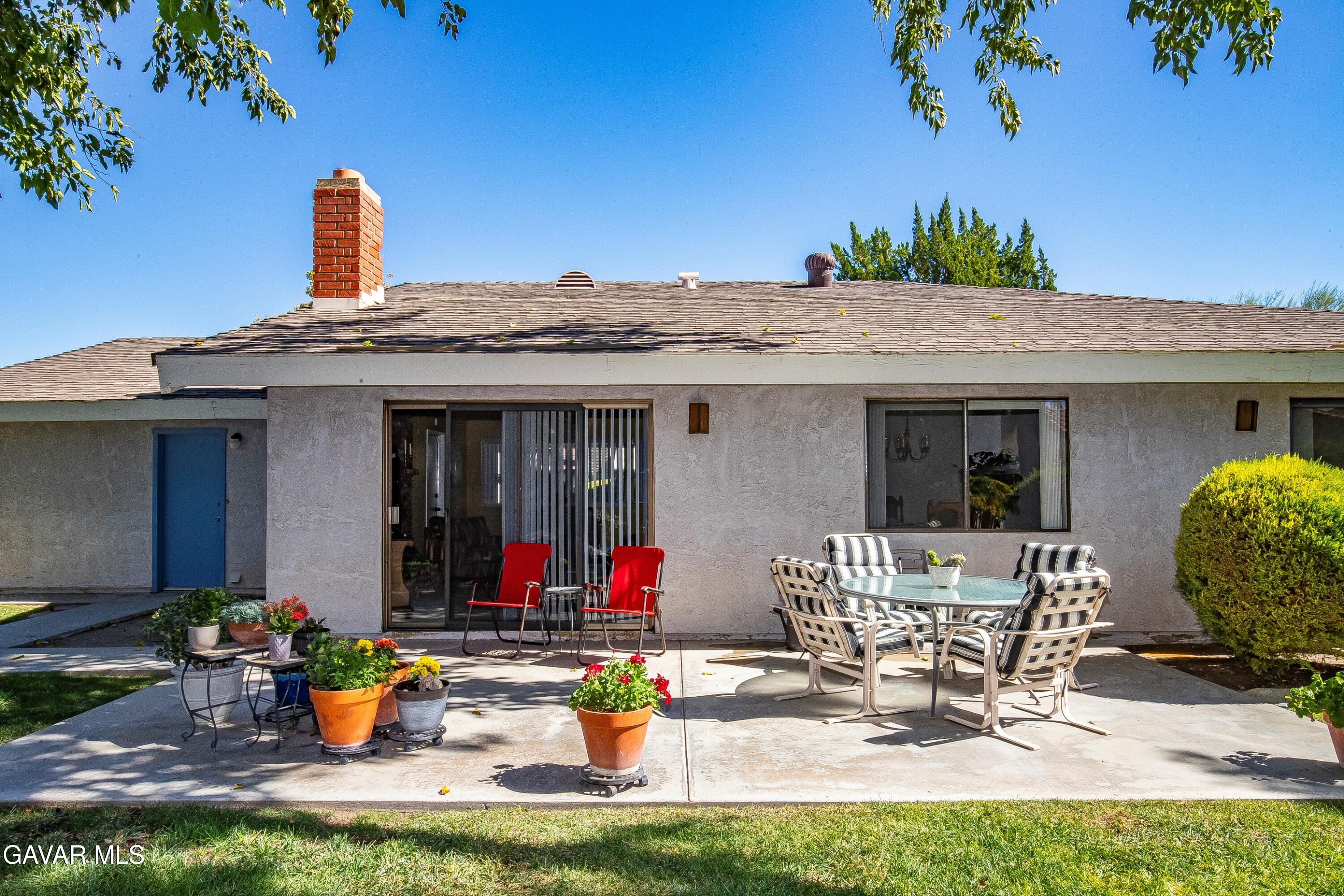 43755 Sentry Lane Lancaster, CA 93536 - Photo 26 of 36 a front view of a house with patio