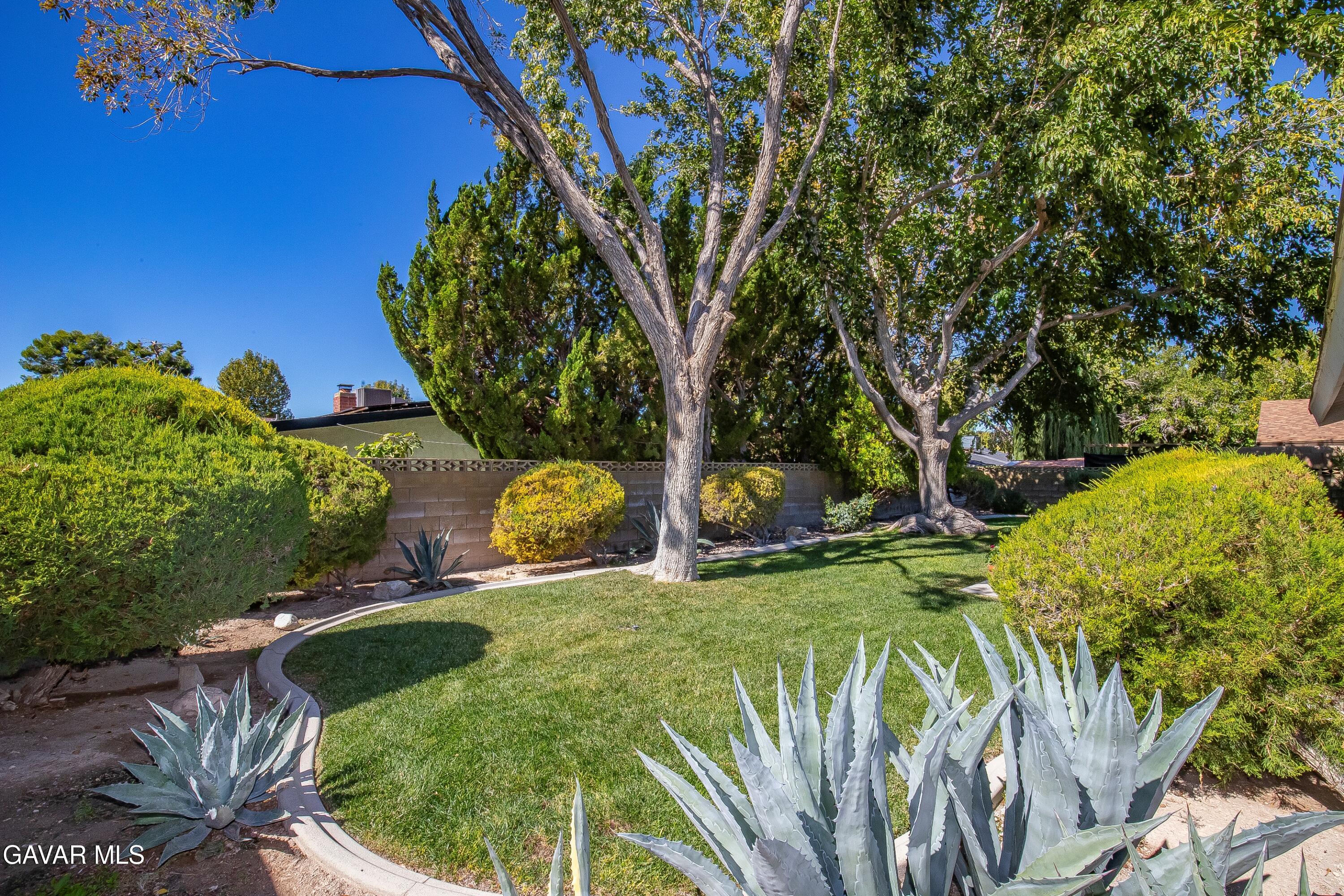 43755 Sentry Lane Lancaster, CA 93536 - Photo 32 of 36 a view of outdoor space with garden