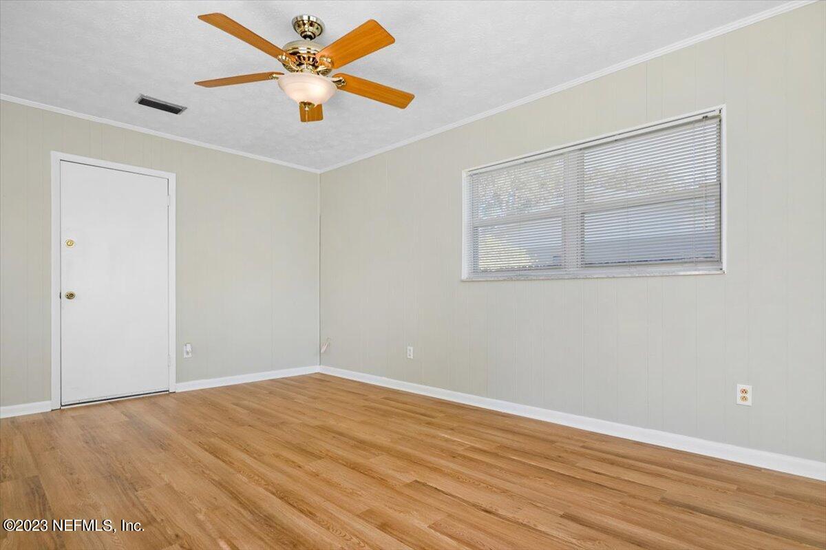 218 Neptune Road Orange Park, FL 32073 - Photo 10 of 31 DR/FR Leading to the Garage