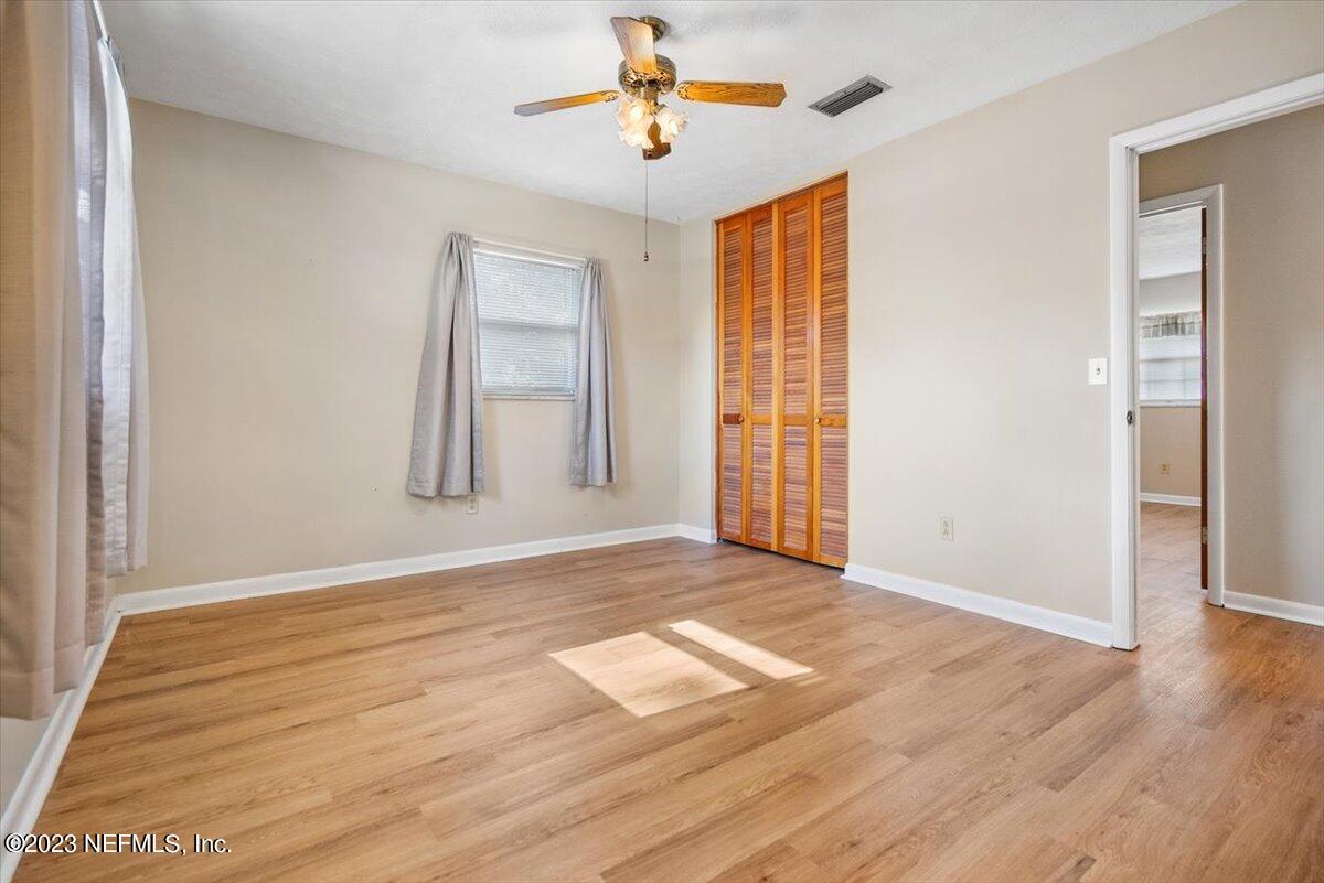 218 Neptune Road Orange Park, FL 32073 - Photo 15 of 31 Pimary Bedroom Leading to the Hallway