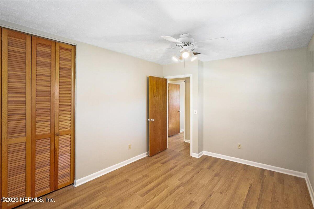 218 Neptune Road Orange Park, FL 32073 - Photo 20 of 31 Guest Bedroom #2 View Toward the Hallway
