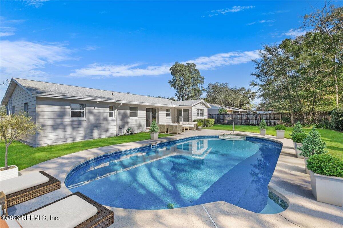 218 Neptune Road Orange Park, FL 32073 - Photo 24 of 31 Virtually Enhenced Poolside Patio