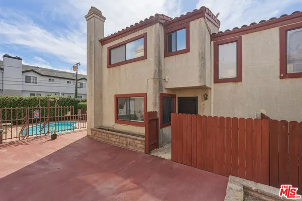 a house view with a garden space