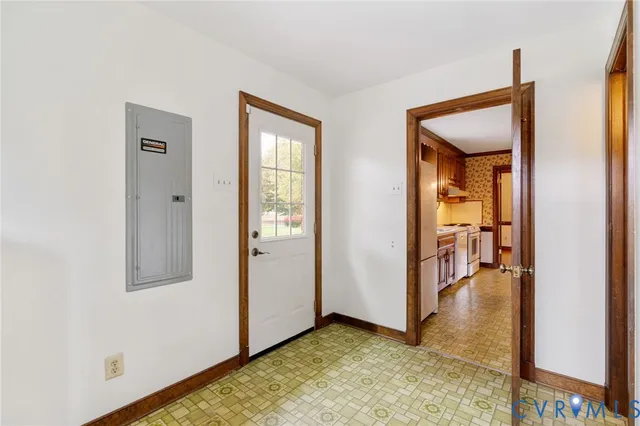 a bathroom with a sink mirror and toilet