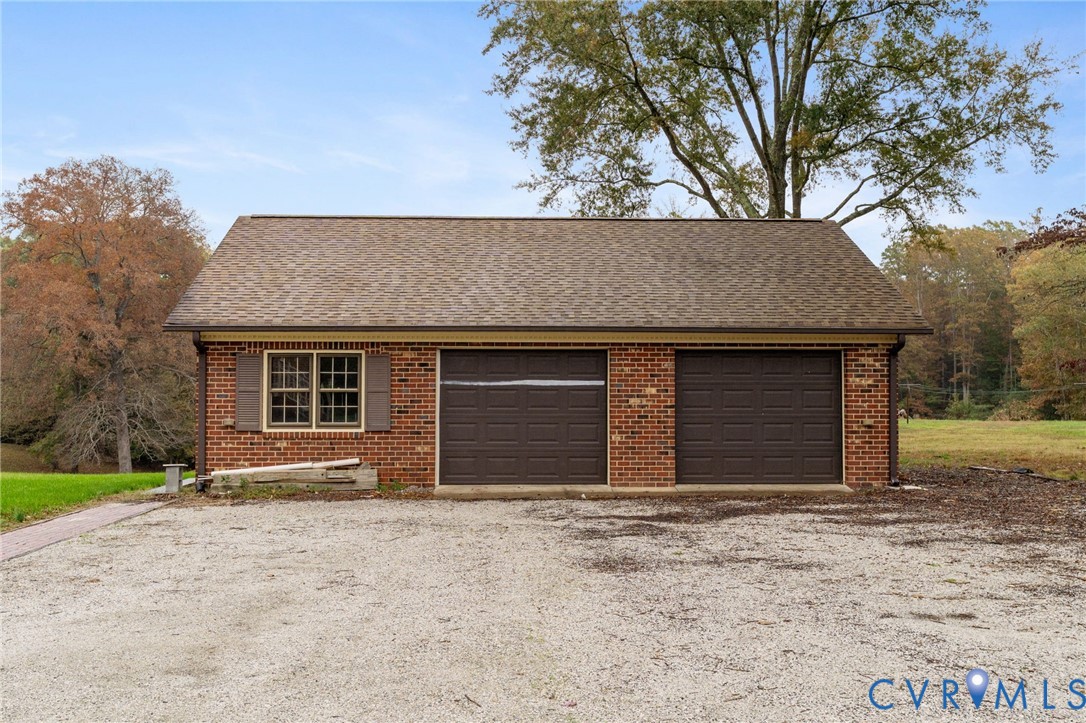 6163 White Oak Road Sandston, VA 23150 - Photo 25 of 39 a front view of a house with a yard