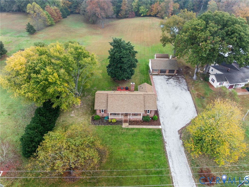 6163 White Oak Road Sandston, VA 23150 - Photo 32 of 39 a view of a backyard with lawn chairs