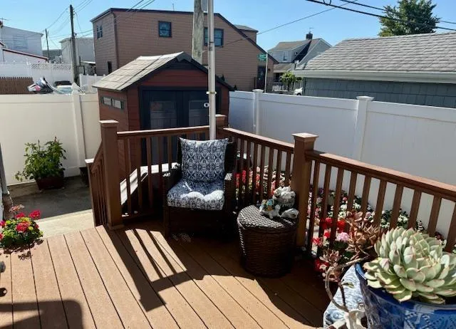 a view of balcony with furniture