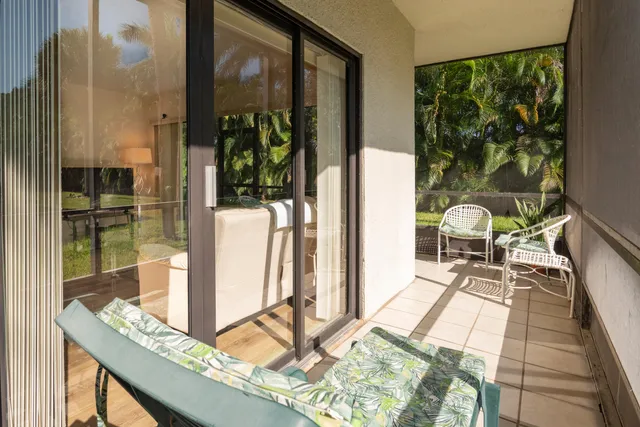 a dining room with a table and chairs