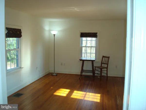 a view of a livingroom with furniture and window