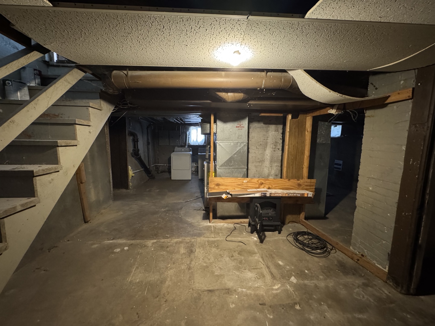 402 Joliet Street, Unit 1 West Chicago, IL 60185 - Photo 11 of 12 a living room with a furniture and a fireplace