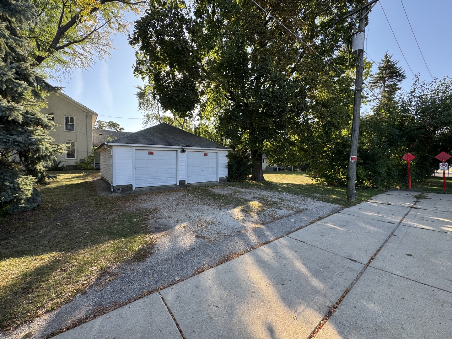 402 Joliet Street, Unit 1 West Chicago, IL 60185 - Photo 12 of 12 a front view of a house with a yard