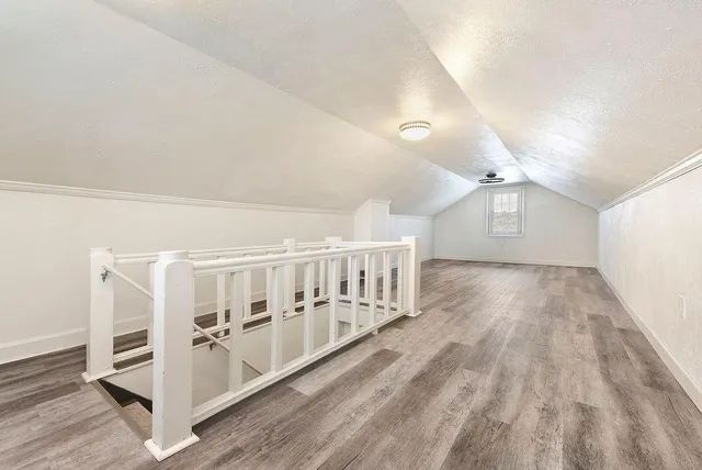 a view of entryway with wooden floor