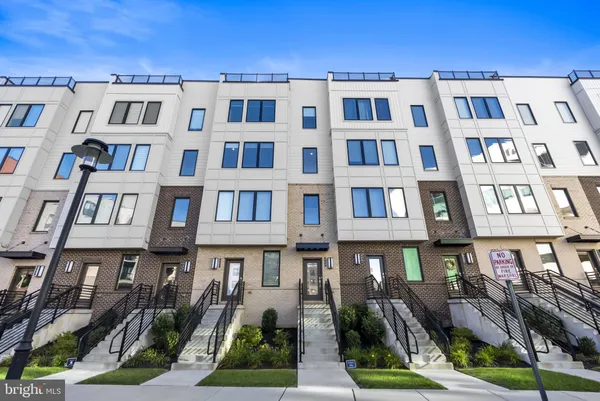 a front view of a multi story residential apartment building