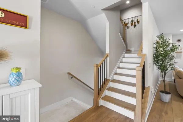 a view of entryway with wooden floor