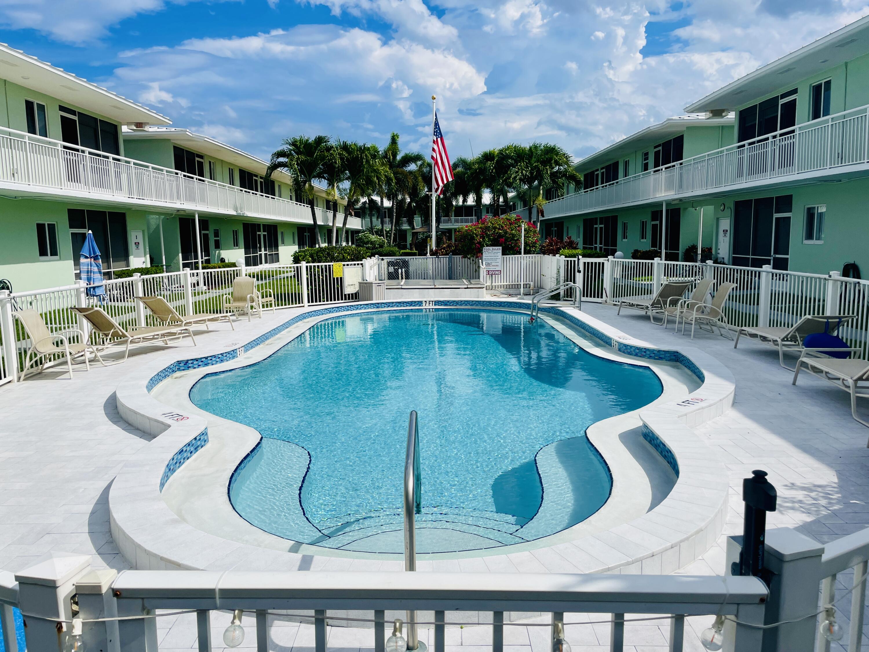 2100 Northeast 38th Street, Unit 142 Lighthouse Point, FL 33064 - Photo 33 of 42 Pool Area (1)