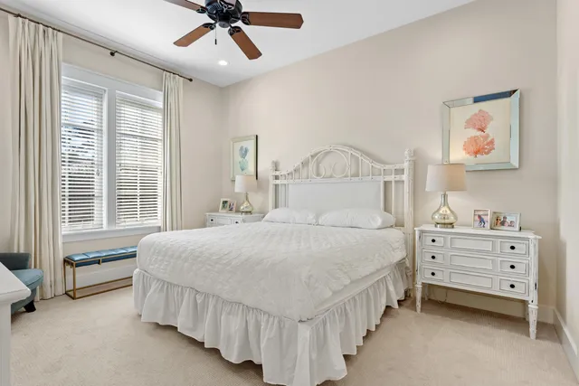 a bedroom with a bed a couch and a couch