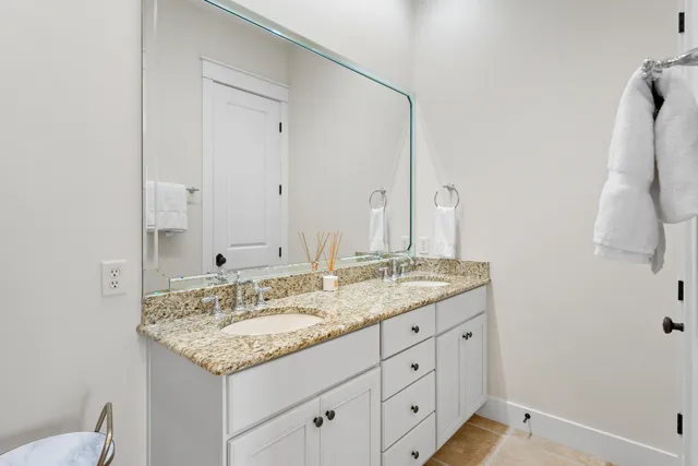 a bathroom with a tub and shower