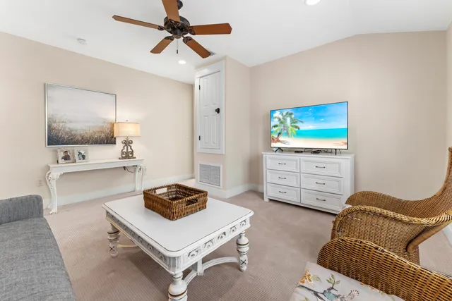 a bedroom with beds and window