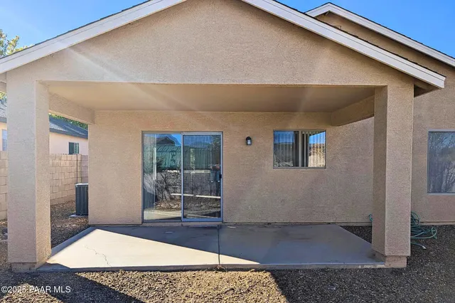 a living room with a rug