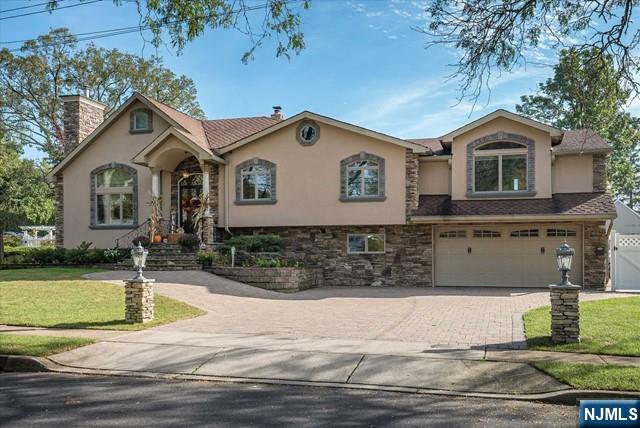 16 Lawrence Road Wayne, NJ 07470 - Photo 1 of 28 a front view of a house with a yard