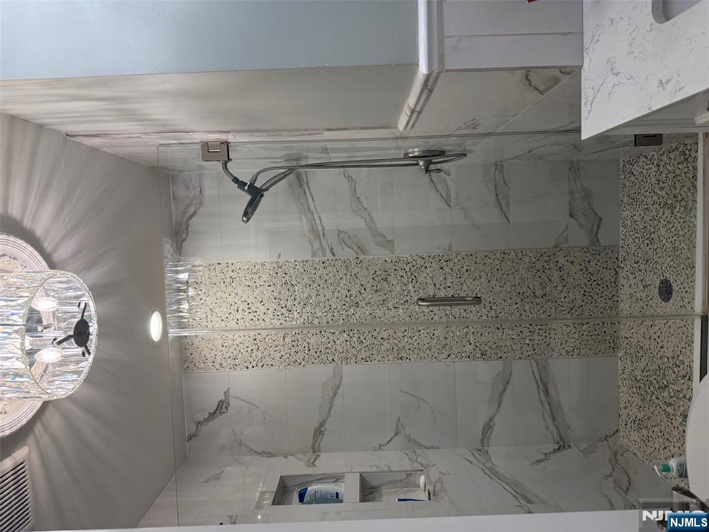 16 Lawrence Road Wayne, NJ 07470 - Photo 13 of 28 a bathroom with a shower