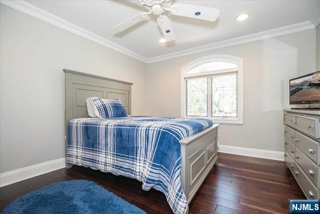 16 Lawrence Road Wayne, NJ 07470 - Photo 21 of 28 a bedroom with a bed and a dresser