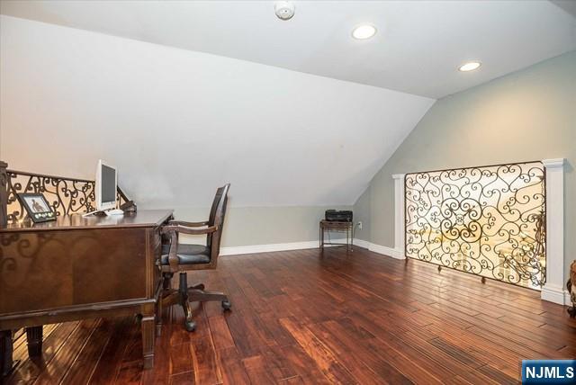 16 Lawrence Road Wayne, NJ 07470 - Photo 24 of 28 a view of a workspace with furniture and wooden floor