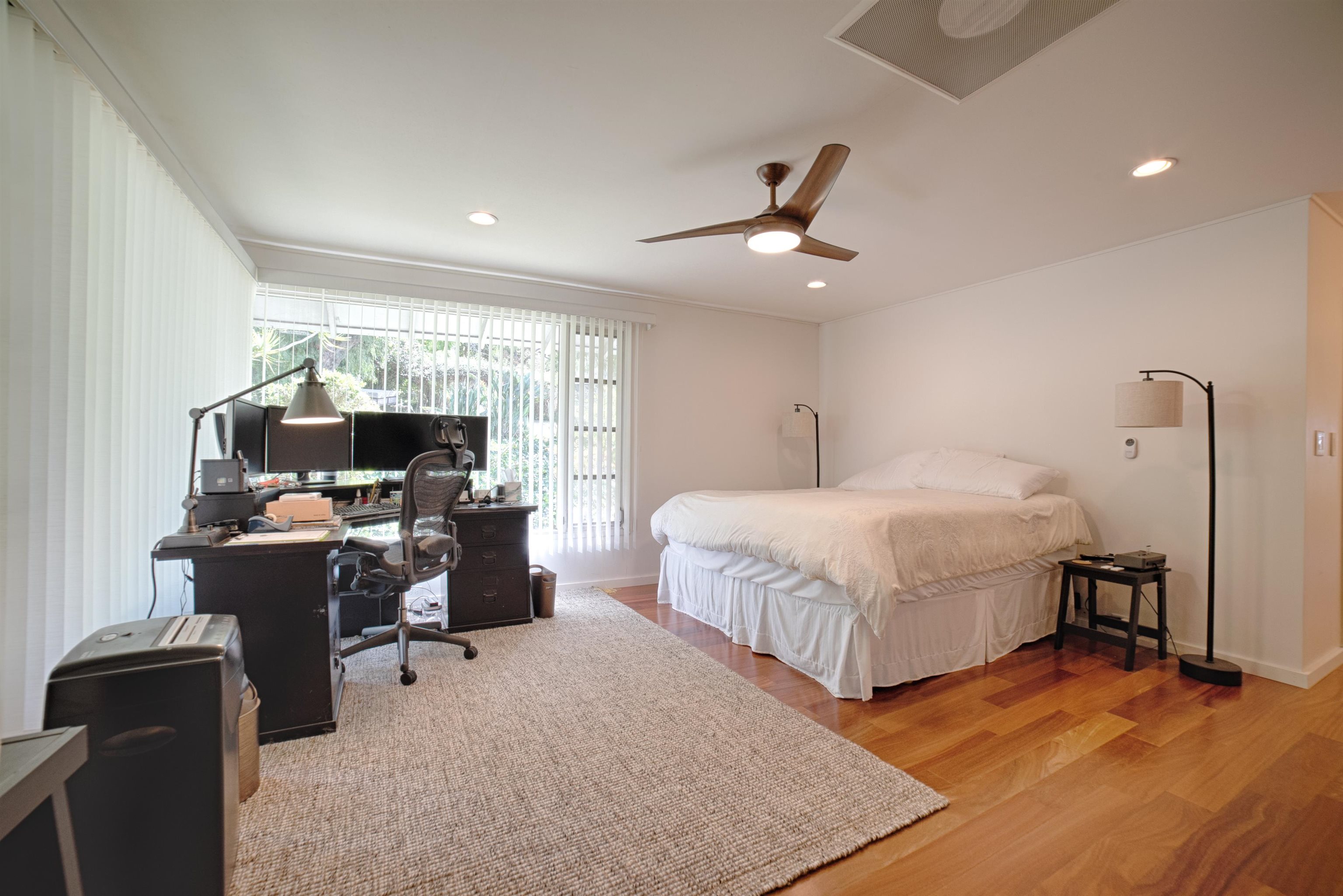 100 A Ihe Place Kula, HI 96790 - Photo 13 of 21 a spacious bedroom with a bed and a large window