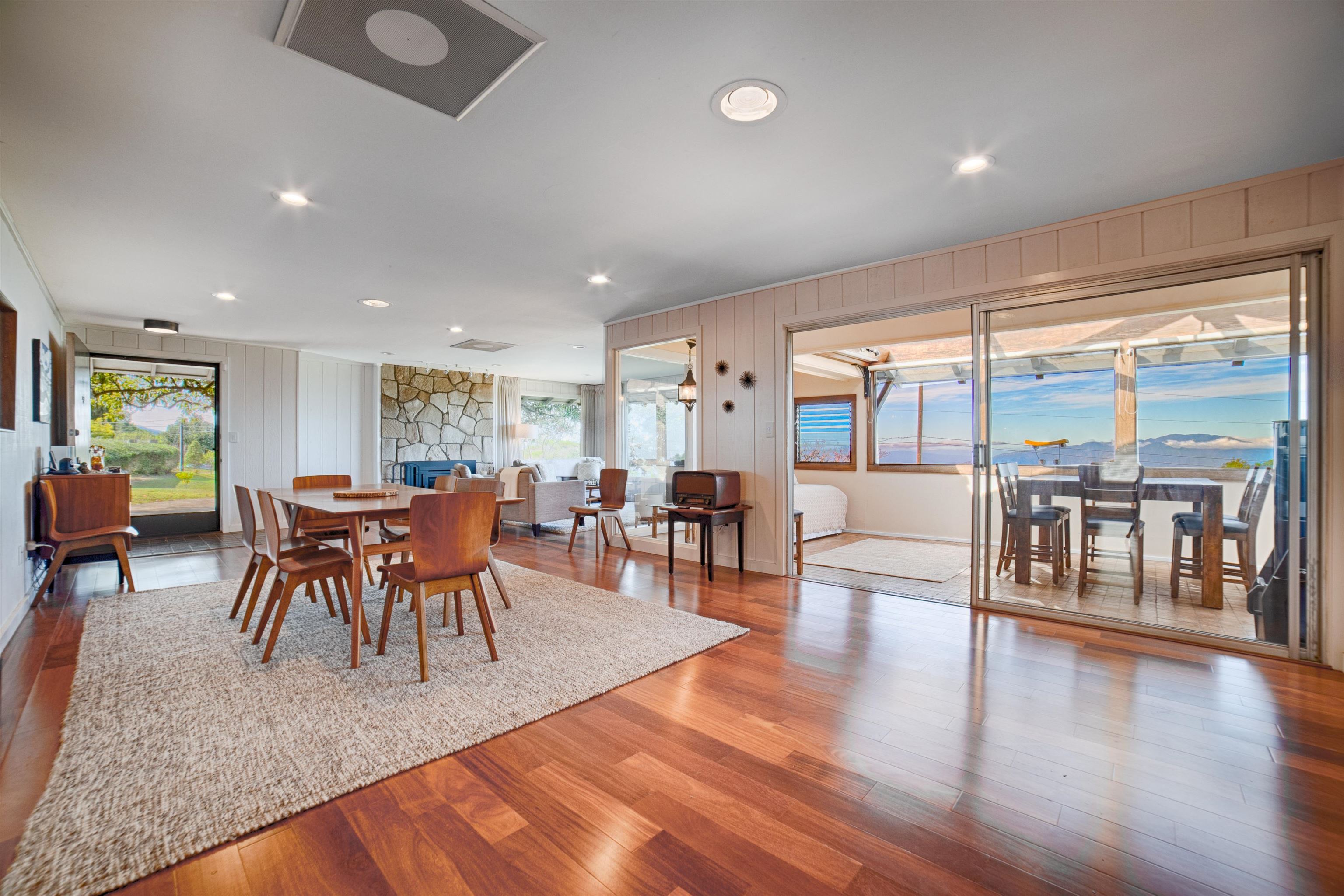 100 A Ihe Place Kula, HI 96790 - Photo 5 of 21 a view of a dining room with furniture and wooden floor