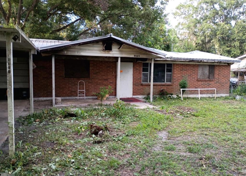 8321 Old Plank Road Jacksonville, FL 32220 - Photo 1 of 8 a front view of a house with garden