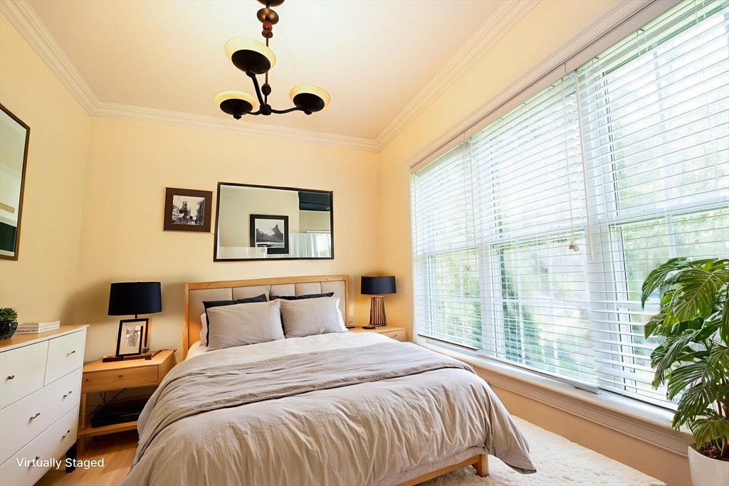 4 Farrar Road Upton, MA 01568 - Photo 17 of 37 a bedroom with a large bed and a large window