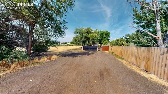 a view of a street with a trees