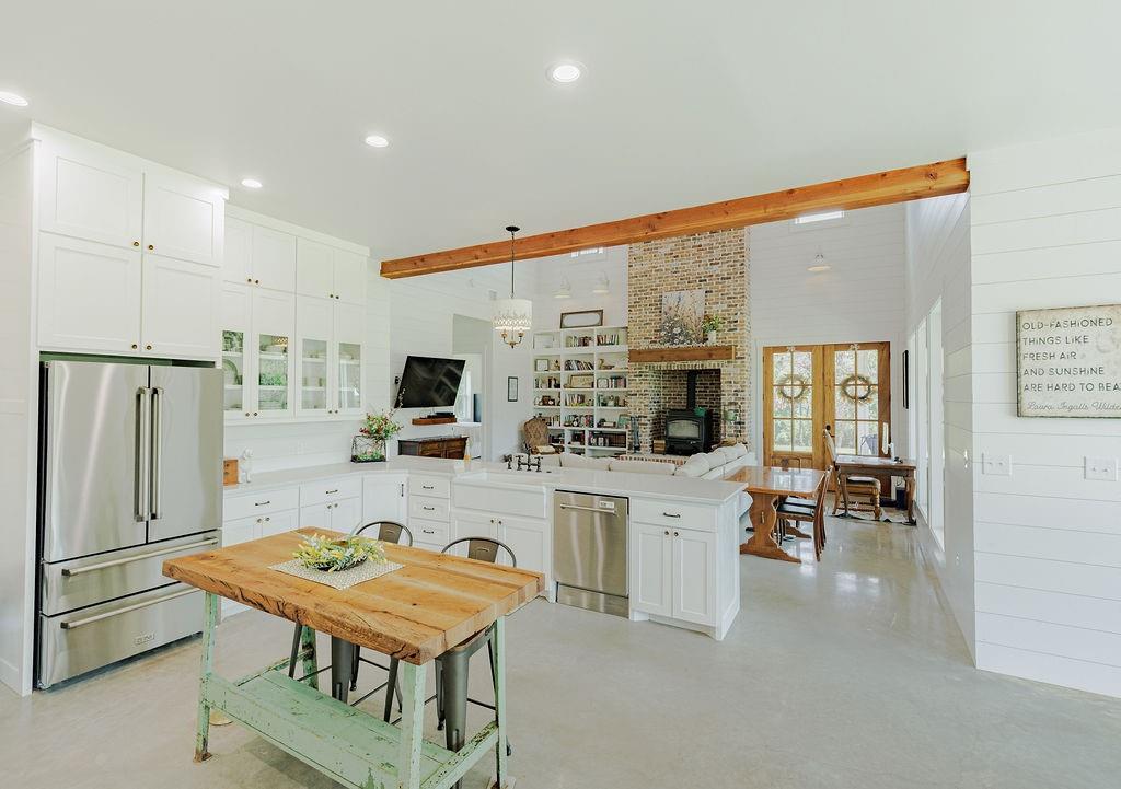2094 Jim Harry Loop Sunset, TX 76270 - Photo 5 of 40 z-line stainless steel appliances and antique brass hardware