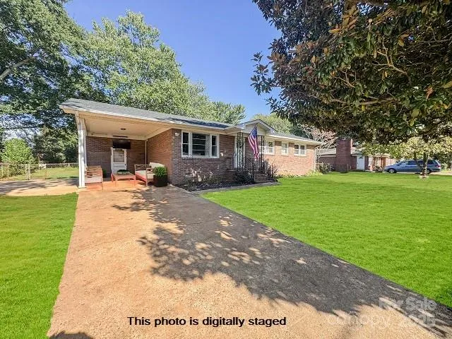 a view of a backyard of the house