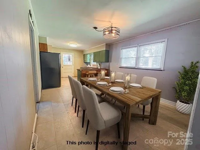 a view of a dining room with furniture