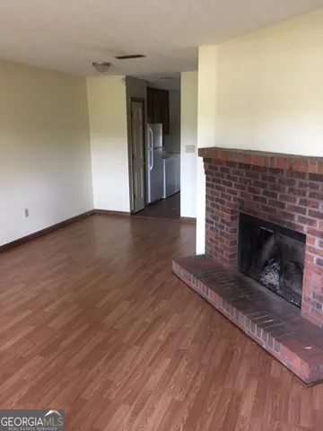 a living room with a fireplace