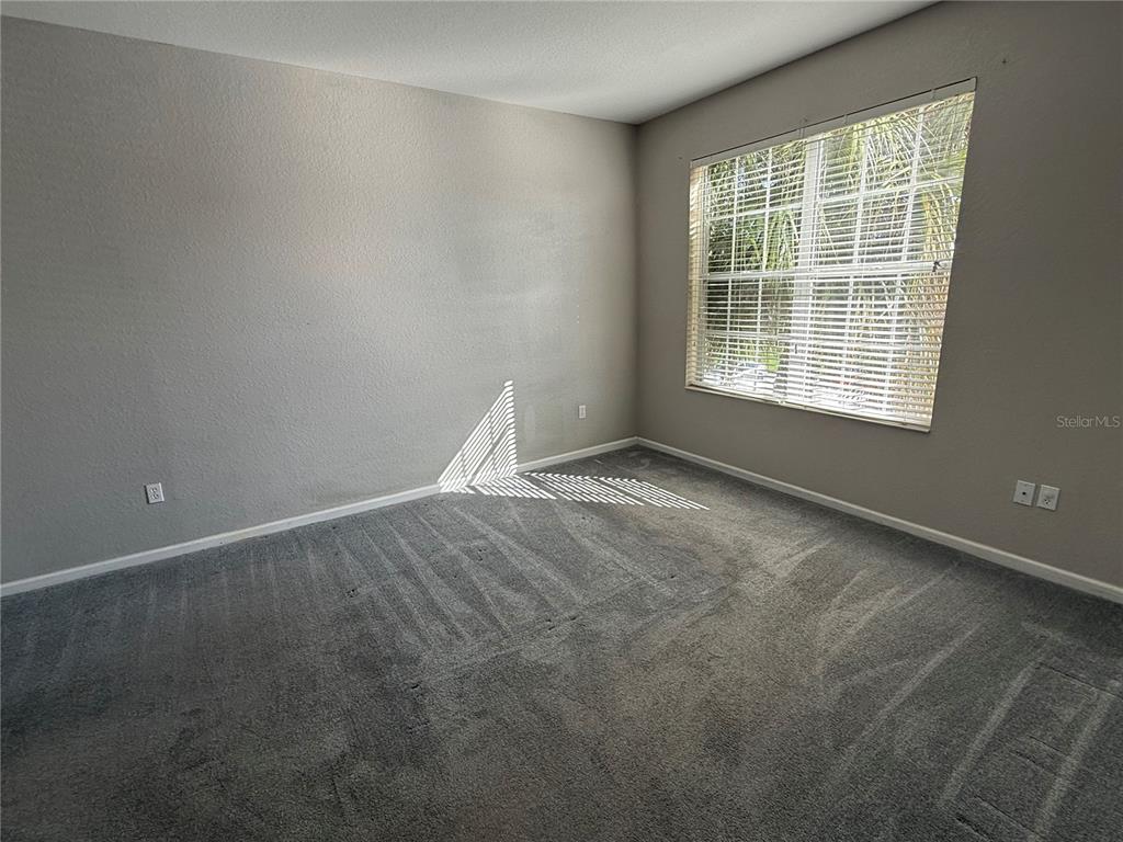 3311 Whitestone Circle, Unit 201 Kissimmee, FL 34741 - Photo 16 of 25 a view of a room with windows