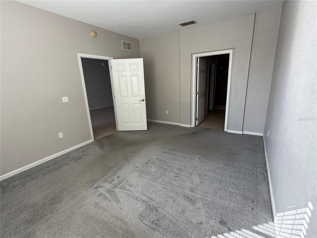 3311 Whitestone Circle, Unit 201 Kissimmee, FL 34741 - Photo 18 of 25 a view of a room with closet
